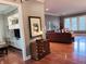 Open-concept living space showcasing hardwood floors and seamless transition to other rooms at 2223 Shaftesbury Rd, Carmel, IN 46032