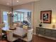 Inviting living space featuring an open floor plan, hardwood floors, and stylish decor at 2223 Shaftesbury Rd, Carmel, IN 46032