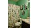 Bathroom with unique shower curtain and decor at 2432 Bridlewood Dr, Franklin, IN 46131