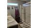 Bathroom featuring a glass enclosed shower and double sinks at 2432 Bridlewood Dr, Franklin, IN 46131