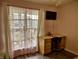 This bedroom features a desk area with a window providing natural light at 2432 Bridlewood Dr, Franklin, IN 46131