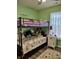 This bedroom features a bunk bed with a variety of stuffed animals at 2432 Bridlewood Dr, Franklin, IN 46131