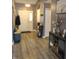 Inviting foyer with wood floors, neutral paint, decorations, and a glimpse of the home's welcoming atmosphere at 2432 Bridlewood Dr, Franklin, IN 46131