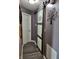 Hallway with a sliding barn door feature at 2432 Bridlewood Dr, Franklin, IN 46131