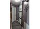 Hallway with a sliding barn door to the laundry room and stylish decor at 2432 Bridlewood Dr, Franklin, IN 46131