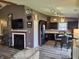 Open kitchen with stainless steel appliances and an adjacent dining area at 2432 Bridlewood Dr, Franklin, IN 46131