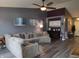 Comfortable living area with neutral tones, a plush sectional, and an inviting ambiance at 2432 Bridlewood Dr, Franklin, IN 46131