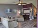 Comfortable living area with neutral tones, a plush sectional, and an inviting ambiance at 2432 Bridlewood Dr, Franklin, IN 46131