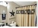 Stylish bathroom with farmhouse decor and vanity at 2538 Bridlewood Dr, Franklin, IN 46131
