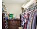 Walk-in closet with ample storage and a wooden dresser at 2538 Bridlewood Dr, Franklin, IN 46131