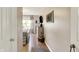 Hallway view leading into bedroom with wood floors and natural light at 2538 Bridlewood Dr, Franklin, IN 46131