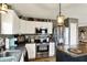 Well-equipped kitchen featuring stainless steel appliances and ample cabinet space at 2538 Bridlewood Dr, Franklin, IN 46131