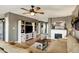 Spacious living room featuring a fireplace, custom shelving, and an open layout at 2538 Bridlewood Dr, Franklin, IN 46131