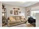 Living room showcases a sofa, stylish decor, and a bright window, offering a cozy and inviting atmosphere at 2538 Bridlewood Dr, Franklin, IN 46131