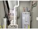 A utilitarian room with a modern water heater and a newer furnace at 2538 Bridlewood Dr, Franklin, IN 46131