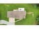 Overhead shot of home with concrete driveway, patio area, and expansive green lawn at 2871 Mullinix Rd, Greenwood, IN 46143