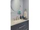 Stylish bathroom sink area featuring speckled countertop and modern fixtures at 2871 Mullinix Rd, Greenwood, IN 46143