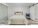 Bedroom with gray flooring, 'Home Sweet Home' pillows, and sliding barn door at 2871 Mullinix Rd, Greenwood, IN 46143