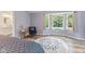 Inviting bedroom with natural light and wood-look flooring at 2871 Mullinix Rd, Greenwood, IN 46143