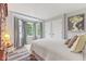 Bright bedroom with bay window, wood-look flooring, and neutral decor at 2871 Mullinix Rd, Greenwood, IN 46143