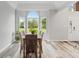 Bright dining room with an arched window and view to the front exterior at 2871 Mullinix Rd, Greenwood, IN 46143