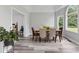 Light-filled dining room with an arched window and views to the outdoors at 2871 Mullinix Rd, Greenwood, IN 46143