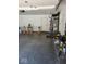 Spacious garage with white walls and door, and concrete flooring at 2871 Mullinix Rd, Greenwood, IN 46143