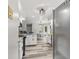 Open kitchen with stainless steel appliances and breakfast bar at 2871 Mullinix Rd, Greenwood, IN 46143