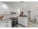 Modern kitchen features white cabinets, granite counters, and stainless appliances at 2871 Mullinix Rd, Greenwood, IN 46143
