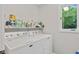 Convenient laundry room with modern washer and dryer at 2871 Mullinix Rd, Greenwood, IN 46143