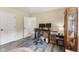 Office space featuring desk, multiple monitors and a view to the hallway at 2871 Mullinix Rd, Greenwood, IN 46143