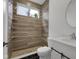 Contemporary bathroom showcasing a sleek shower, stylish vanity, and modern fixtures at 2903 Winthrop Ave, Indianapolis, IN 46205