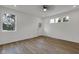 Bedroom with ample natural light and entry to backyard through glass-paneled door at 2903 Winthrop Ave, Indianapolis, IN 46205