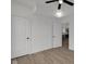 Cozy bedroom with hardwood floors and a doorway leading to another room at 2903 Winthrop Ave, Indianapolis, IN 46205