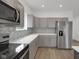 Stylish kitchen featuring sleek countertops, stainless steel appliances, and modern cabinetry at 2903 Winthrop Ave, Indianapolis, IN 46205