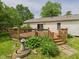 Wooden deck and landscaped yard area at 3004 N Timber Ln, Muncie, IN 47304