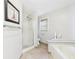 Clean bathroom featuring a glass-enclosed shower and a tiled tub at 3004 N Timber Ln, Muncie, IN 47304