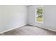 Cozy bedroom featuring neutral walls and carpet at 3004 N Timber Ln, Muncie, IN 47304