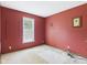 Simple bedroom with a window and wall trim at 3004 N Timber Ln, Muncie, IN 47304