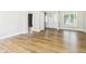Spacious living room showcasing luxury vinyl flooring and a bright, airy atmosphere at 3004 N Timber Ln, Muncie, IN 47304