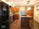 Modern kitchen featuring stainless steel appliances, custom cabinetry, and granite countertops at 3456 S Sadlier S Dr, Indianapolis, IN 46239