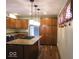 Spacious kitchen island, ample cabinet storage and pendant lighting create a functional workspace at 3456 S Sadlier S Dr, Indianapolis, IN 46239