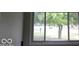 A tree is easily viewed from this double-hung window at 3456 S Sadlier S Dr, Indianapolis, IN 46239