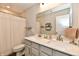 Bathroom featuring a double vanity with modern fixtures and bright lighting at 3872 New Battle Ln, Bargersville, IN 46106