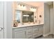 Bathroom with a double vanity, quartz countertops, tile floors, and a large mirror at 3872 New Battle Ln, Bargersville, IN 46106