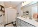 Bathroom with double vanity, gray cabinets, and modern fixtures at 3872 New Battle Ln, Bargersville, IN 46106