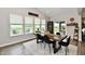 Dining room with a backyard view, sliding glass doors, and an outdoor seating area at 3872 New Battle Ln, Bargersville, IN 46106