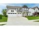 Stunning two-story home with a manicured lawn, vibrant landscaping, and spacious driveway at 3872 New Battle Ln, Bargersville, IN 46106