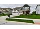 Home with well maintained lawn, cute landscaping, mailbox and three car garage on a cloudy day at 3872 New Battle Ln, Bargersville, IN 46106