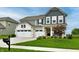 Beautiful home with well maintained lawn, cute landscaping, mailbox and three car garage at 3872 New Battle Ln, Bargersville, IN 46106